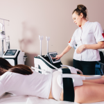 tech and client discussing top body sculpting treatments in Great Falls