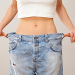 woman displaying the benefits of weight loss injections in Alexandria