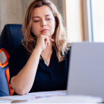 woman researching liposuction prices near Falls Church