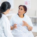 doctor and patient discussing cellulite reduction cost near Alexandria