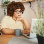 woman researching how long does non-surgical body contouring last