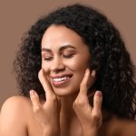 woman after peptide therapy for skin rejuvenation in Arlington
