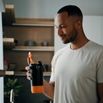 man reading Ultra Body Sculpt's Morpheus8 day-by-day recovery guide