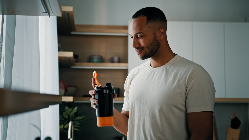 man reading Ultra Body Sculpt's Morpheus8 day-by-day recovery guide